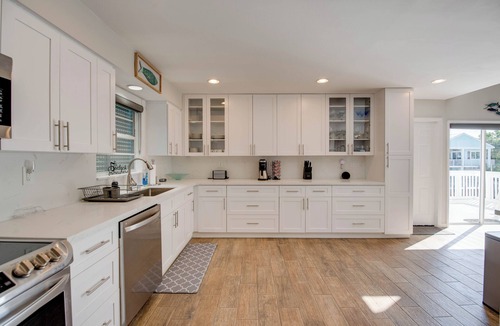 Cutthroat Harbor Estates House | Beautiful 3BR/3BA Canal Home with Pool, Modern Upgrades, Dock for 28' Boat, Fenced Backyard