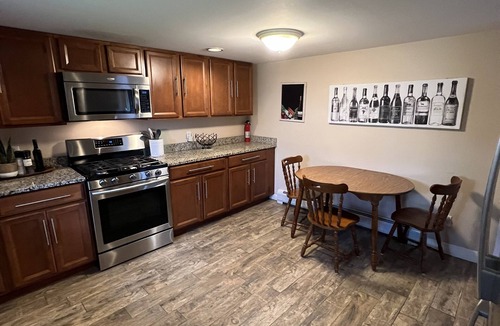 Pittsfield House | Beautiful 8 Bedroom, Walk to Lake, Jetted Hot Tub, Fireplace, & Pool Table