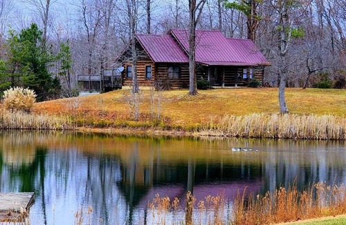 Beattyville Cabin | Beautiful, authentic log cabin with acres of land, fishing pond, and hot tub.