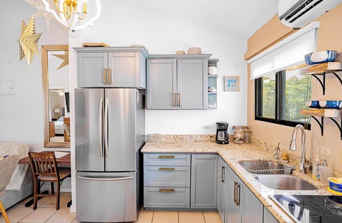 Coco Sunset Hills Condo | Beautiful condo! Steps to beach, shops, dining!