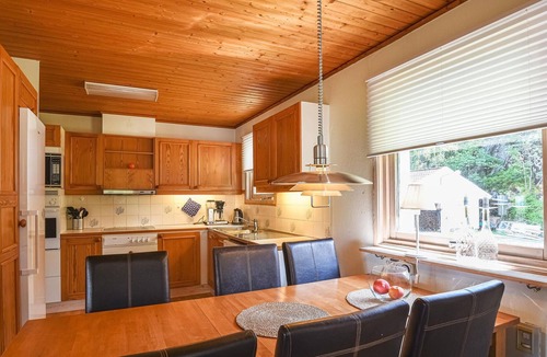 Munkeby House | Beautiful cottage with open and glazed terrace.
