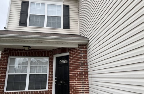 Charlotte House | Beautiful end unit vacation home for short term rental with adequate sunlight.