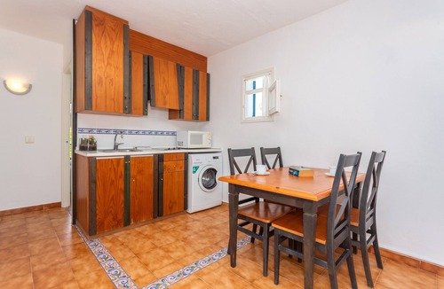 Cap d'Artrutx Apartment | Beautiful Apartment "Bon Repos A7" with Pool, Wi-Fi, Terrace and Garden
