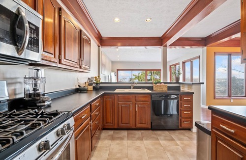 South Side Slopes House | Beautiful Hillside Home with Incredible City Views! Great Location and Privacy!