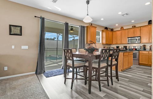 Trafalgar Village House | Beautiful home close to theme parks with private oool, AC & W/D - dog-friendly