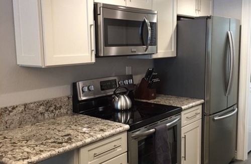 Desert Shores Condo | Beautiful Lakefront Condo with Amazing Views!