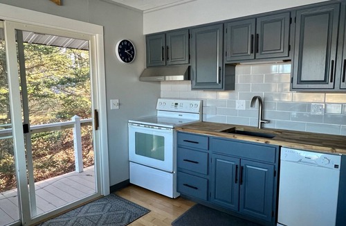 Mears Cottage | Beautiful lakefront cottage within minutes of sand dunes and Lake Michigan