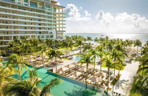 Puerto Juarez Condo | Beautiful location offers white-sand beaches, gourmet dining and infinity pool