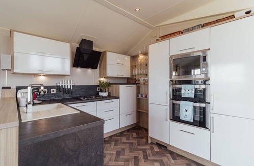 Sheerness Ski Chalet | Beautiful lodge - stunning sea views, dog friendly