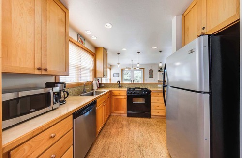 Shorepine Village House | Beautiful modern home with great beach access fireplace and outdoor shower