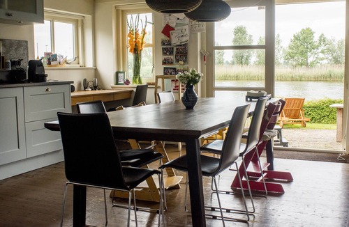 Weesp House | Beautiful original windmill along the riverside