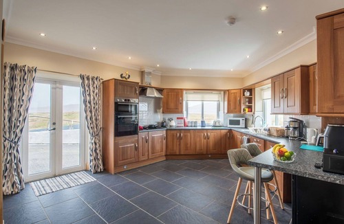 Lochboisdale House | Beautiful private villa for 17 guests with WIFI, hot tub, TV, patio and panoramic view