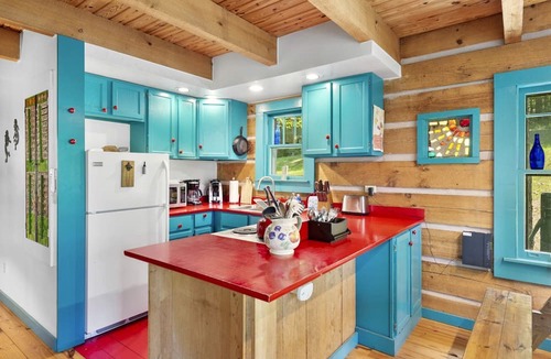 Marshall Cabin | Beautiful Rustic Cabin Surrounded by Nature with Incredible Views and a Wrap-Around Deck for an Amazing Glamping Experience in Marshall, NC