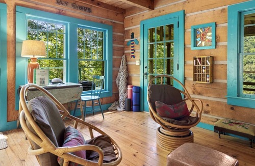 Marshall Cabin | Beautiful Rustic Cabin Surrounded by Nature with Incredible Views and a Wrap-Around Deck for an Amazing Glamping Experience in Marshall, NC