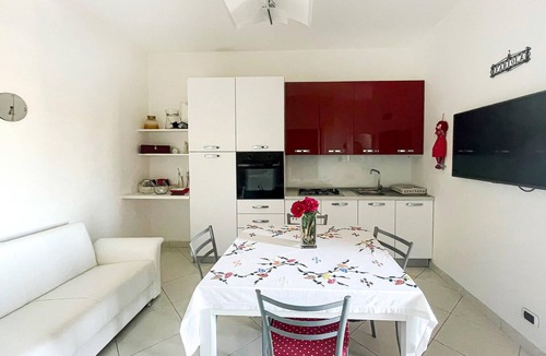 Aradeo Apartment | Beautiful vacation home with common courtyard and bar area.