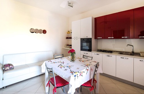 Aradeo Apartment | Beautiful vacation home with common courtyard and bar area.