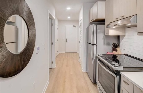 Buzzard Point Apartment | Beautiful Waterfront 1BR w Full Kitchen + Gym | nr Rivers