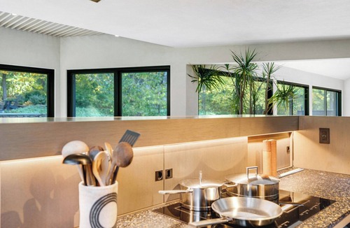 Tuckahoe House | Beautifully Designed and Modern Southampton Home Surrounded by Nature,.