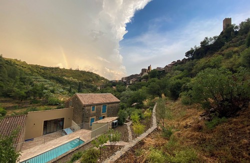 Roquebrun House | Beautifully restored wine grower’s house with pool in stunning riverside village