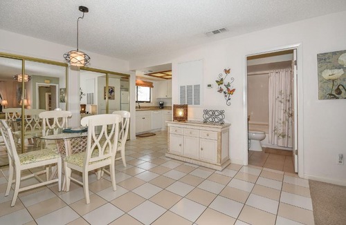 New Smyrna Beach Apartment | Beautifully updated bright and cheery 2nd story condo near pool beach access- SC261