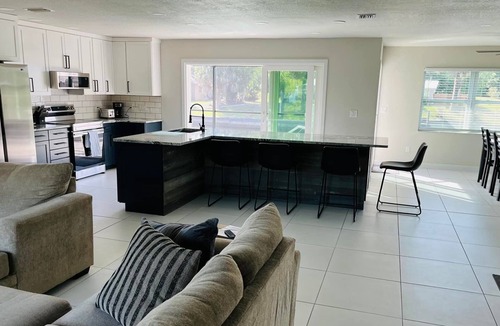 Harbour Heights House | Beautifully updated home on canal with heated pool - no additional charge.