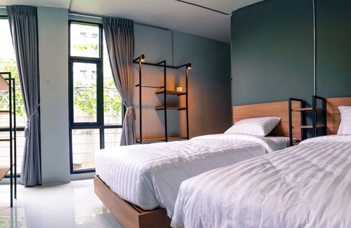 Suan Luang Hotel | Bed Garden 26
