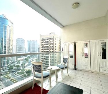 Barsha Heights Apartment | Bed in mixed room