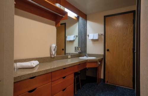 Salt Lake Mountain Resorts Hotel | Bedroom unit at the Iron Blosam at Snowbird resort over new years week