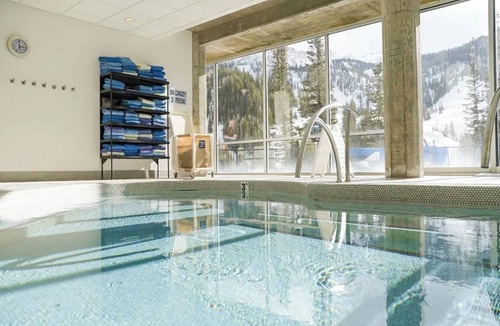 Salt Lake Mountain Resorts Hotel | Bedroom unit at the Iron Blosam at Snowbird resort over new years week