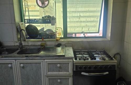 Sharjah Apartment | Bedroom with shared kitchen men only