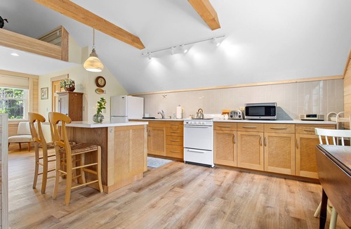 Cushing House | Bent River Guest Quarters - River-view retreat for 2 with kitchen, patio, AC, Wi-Fi