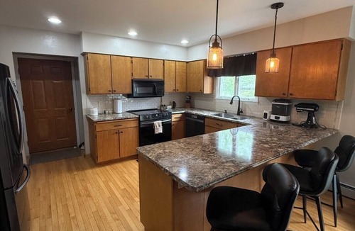 Oshkosh House | Best EAA Location – Walk to AirVenture from This 4BR Home