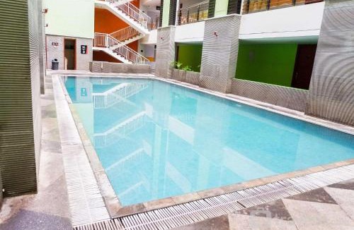 Siwalankerto Apartment | Best Value & Spacious Studio Room Apartment at High Point Serviced By Travelio