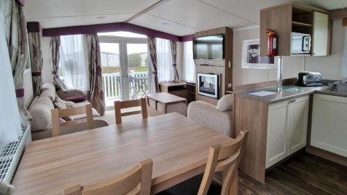 Pagham House | Betty by the Bay, Church Farm Caravan Stay