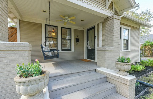 Greater Heights House | Beverly is a charming 1925 cottage-style bungalow in The Heights, sleeping 4 (2B/1B) and filled with natural light. Walk to the jog track, tennis courts, and local shops/eateries. Enjoy a fenced, pet-friendly yard, front porch swing, and a relaxing b