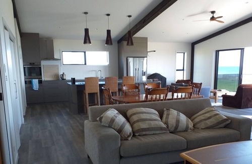 Waiotahi House | Big Black Beachfront Bach in family friendly community.
