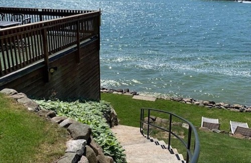West Bend House | Big Cedar Lake, 125 feet of sandy frontage, beautiful shore, sunsets, spacious