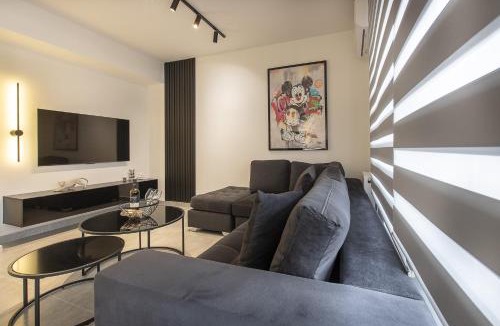 Ilisia Apartment | Black & White 2BR Apt steps from Mavili Square