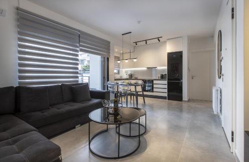 Ilisia Apartment | Black & White 2BR Apt steps from Mavili Square
