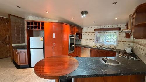 Suva House | Blissfull Corner at Centerpoint Unit 1