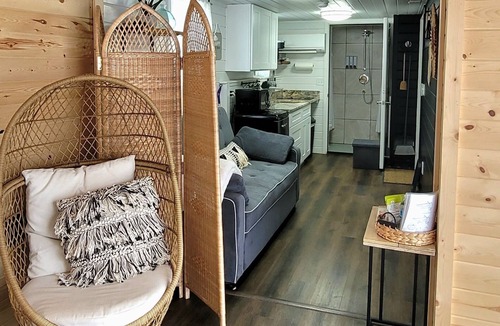 Logan House | Blue Bird Tiny House Shipping Container: Hot Tub + Rooftop Deck in Hocking Hills