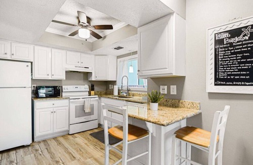 Butler Beach Condo | Blue Bungalow -Pool and Beach retreat!