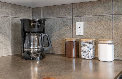 Southwest Calgary Apartment | Blue Moon | Playground | Backyard | Pet Friendly