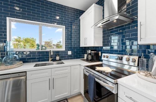 Marathon Villa | Blue Pearl New Waterfront Haven with Heated Pool ,70 Foot Dock, and More!