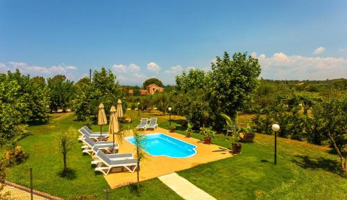 Roda Apartment | Blue wave beach villa with pool 100m from the beach