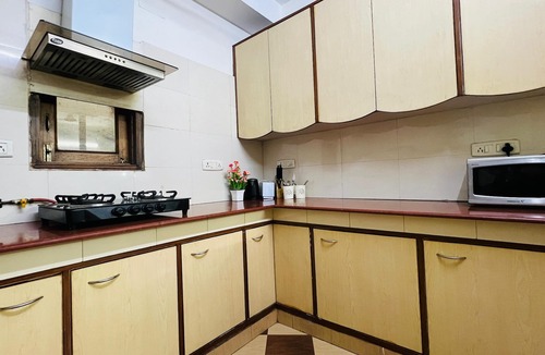 Defence Colony Apartment | BluO Classic 1BHK - Defence Colony Market