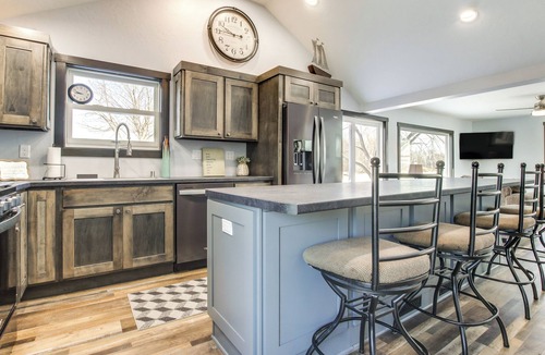 Oconto House | Boat Dock: Riverfront Oconto Home!