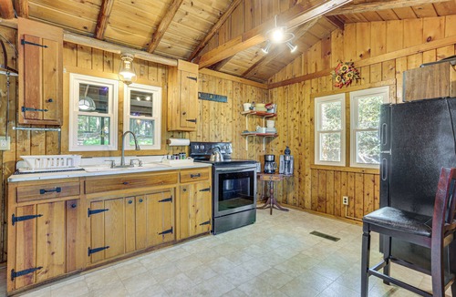 Greentown Cottage | Boat, Hike & Fish: Rustic Greenwood Retreat