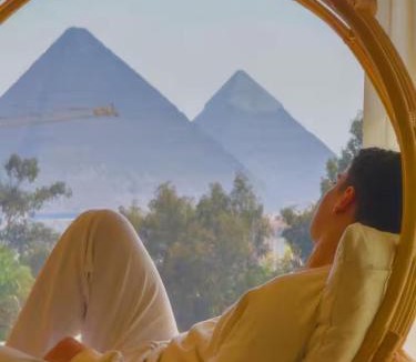 Al Haram Apartment | Bohemian Oasis with Pyramids View Ancient Bohemian Giza Khan