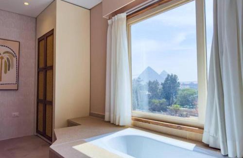 Al Haram Apartment | Bohemian Oasis with Pyramids View Ancient Bohemian Giza Khan